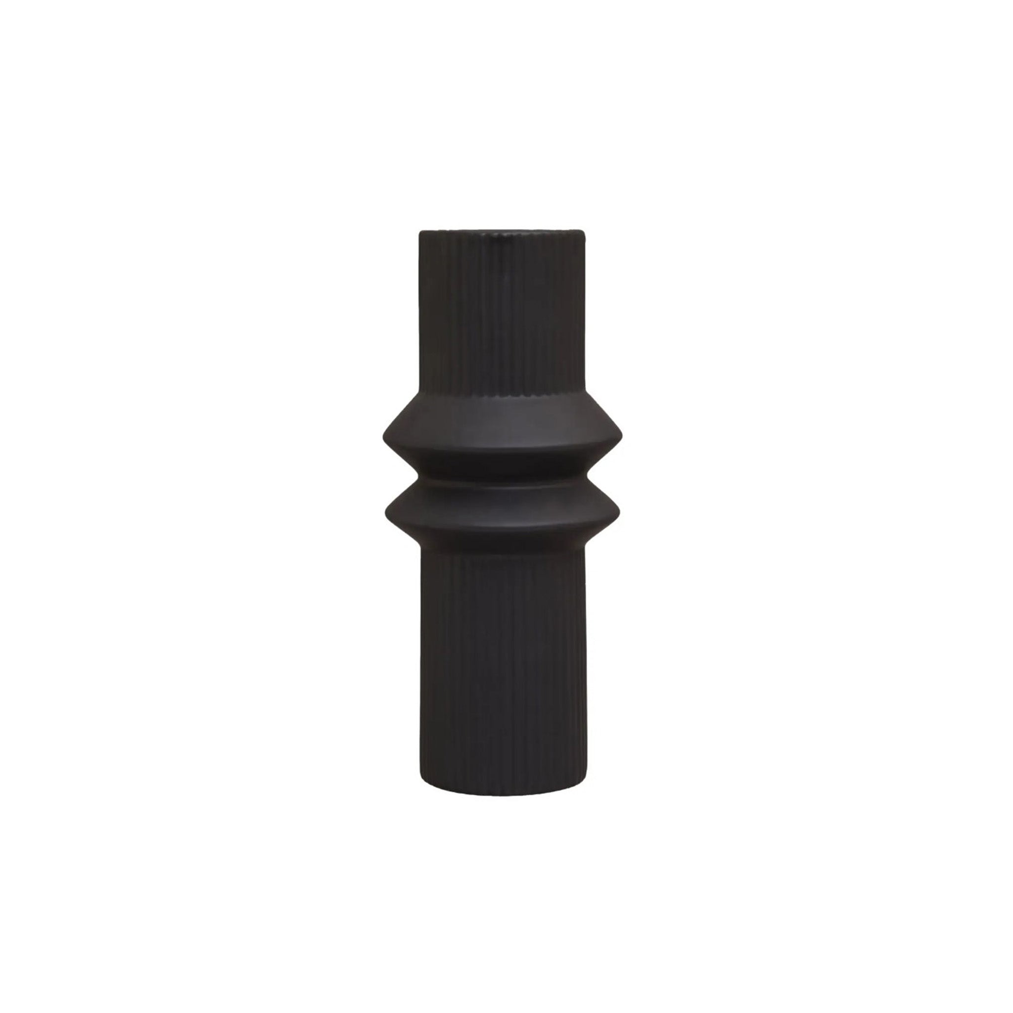 Geometric matte black vase with a soft ribbed surface. A minimalistic angular design to the centre, made from fine stoneware which does not chip or wear. Dimensions: H28 x D12 x W12 Materials: Dolomite Delivery: 7-10 working days